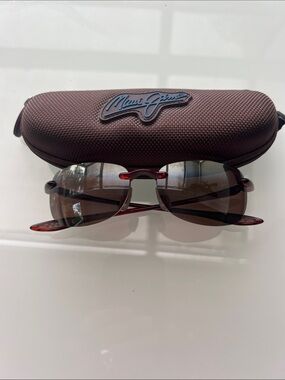 Maui Jim Brown Rimless Sunglasses with Tortoise Temples and Blue Logo Case